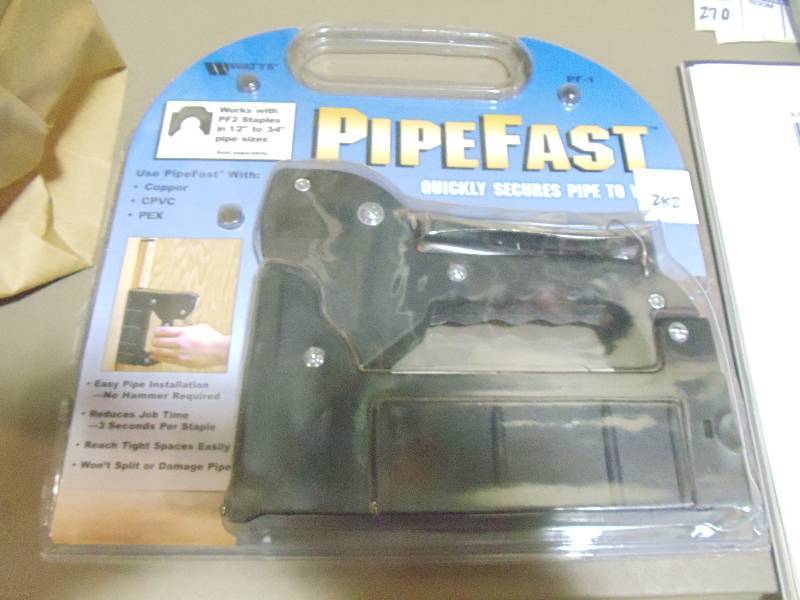 lot 282 image: NEW PipoeFast Stapler for Use with Copper, Pex and CPVC Pipes. Uses PF2 Staples for up to 3  4 in Pipes