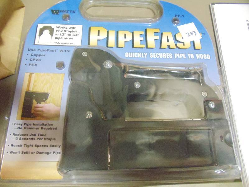 lot 283 image: NEW PipoeFast Stapler for Use with Copper, Pex and CPVC Pipes. Uses PF2 Staples for up to 3  4 in Pipes