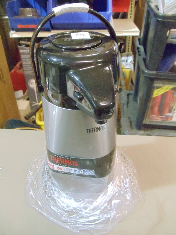 lot 362 image: NEW Thermos Vacuum Insulated 2 Qt Beverage Thermos and Dispensor, Pump Action, Keeps Hot 12 hrs  Keeps Cool 24 Hours, dented but Vacuum Bottle Intact and All Else Works