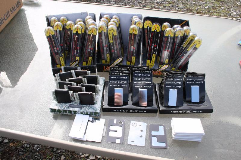 Lot of Money Clips, Laswer Writer Pens, and phone accesories