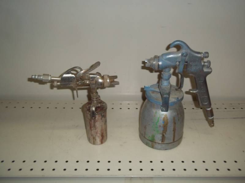 lot 19 image: 2 Air Brush Paint guns with canisters, model #370 binks, and a central brand