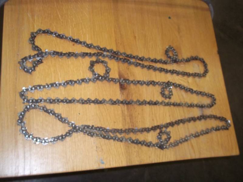 lot 52 image: 3 chainsaw chains size 33