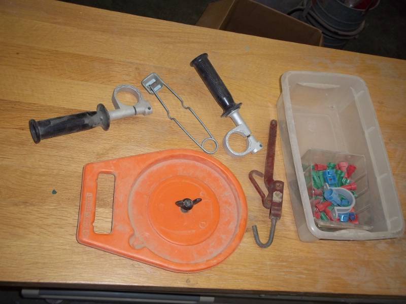lot 53 image: saw blade holder, torch igniter, 2 drill handles, wire nuts, chain binder