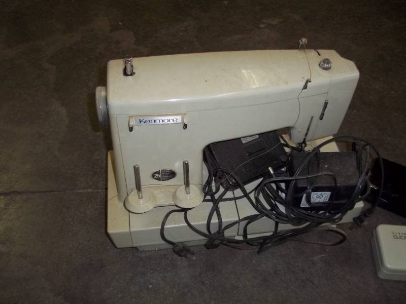 lot 68 image: Kenmore sewing machine model 1680 convertible wattachments