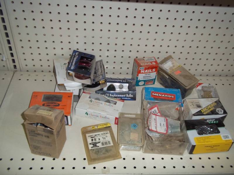 lot 99 image: assorted boxes nails, screws, bulbs, staples, concrete anchor screws