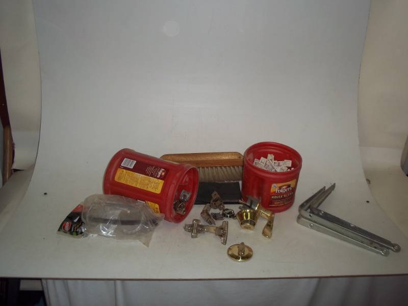 lot 183 image: cabinet hinges, shelf brackets, safety goggles, wall paper brush, door lock and knob