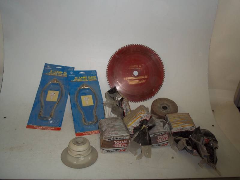 lot 189 image: steel wool assorted, 2 8 lamp harp, 12 saw blade Teflon coated carbide, sanding wheel, thermostat