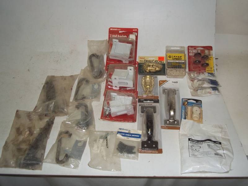 lot 225 image: wall anchors, door pulls, door decors, furniture glides, utility door pulls, tile spacers, drawer catches, screw bumpers
