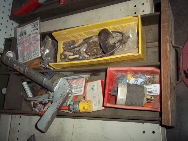 lot 234 image: steel drawer wcalking gun, lamp parts, electrical plug, new box cable staples, liquid electrical tape drawer included