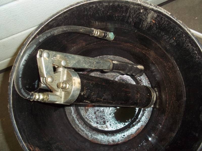 lot 290 image: grease gun black includes 5 gal. bucket