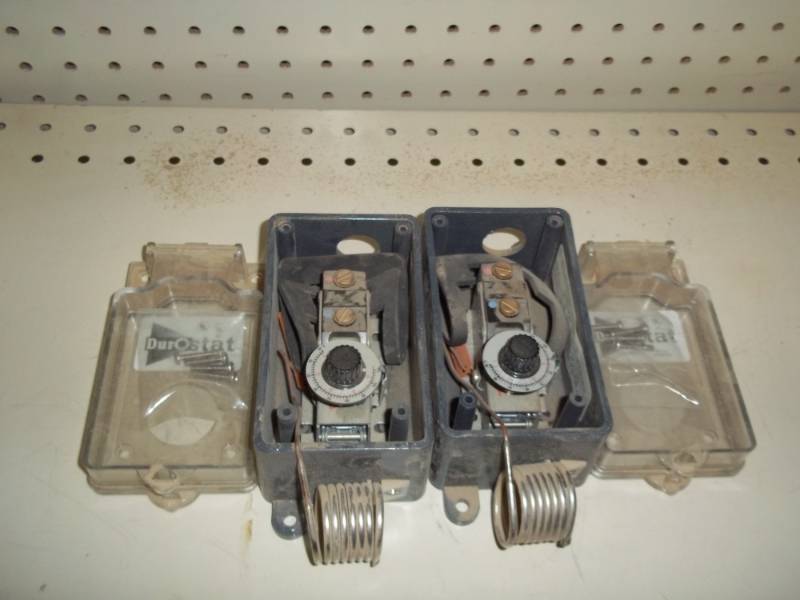 lot 293 image: pair of thermostats (looks unused)