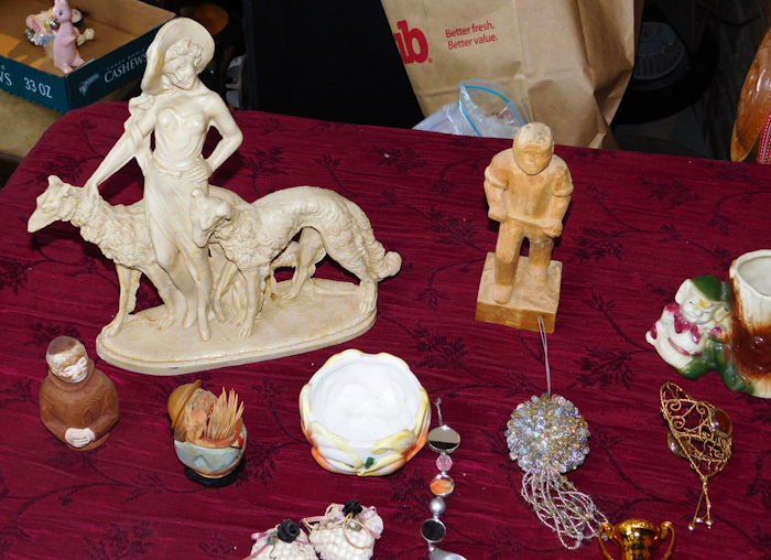 lot 105 image: lot of decorative figurines French lady with dogs, wooden lumberjack, elf planter