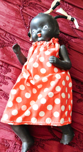 lot 44 image: vintage ceramic doll politically incorrect all parts are present