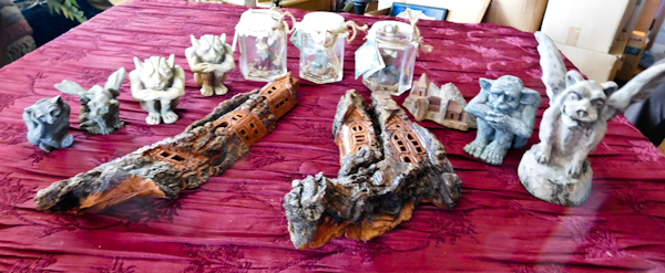 lot 56 image: gargoyles and wooden tree like art
