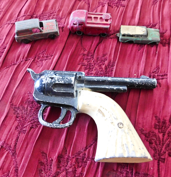 lot 61 image: vintage toys Fiery Fred metal fire truck, two metal cars and a die cast pistol