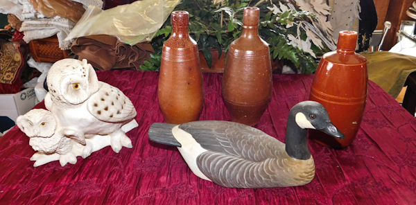 lot 64 image: owls a duck and English pint bottles
