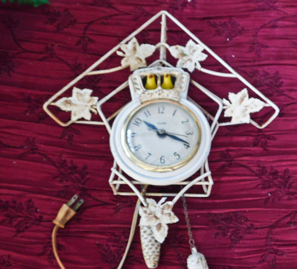 lot 92 image: vintage metal cuckoo type looking clock untested