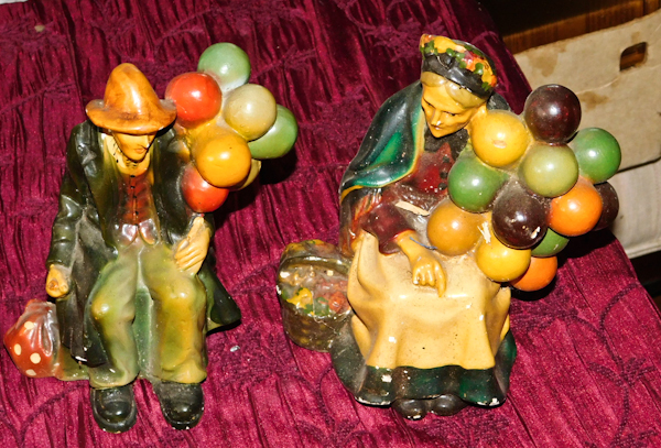 lot 111 image: Vintage old hobo gypsy couple with balloons