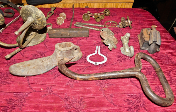 lot 118 image: several metal decorative items bell, hay bale hook wall candle sconce