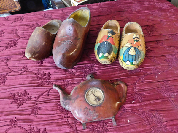 lot 132 image: clogs and a teapot room thermometer