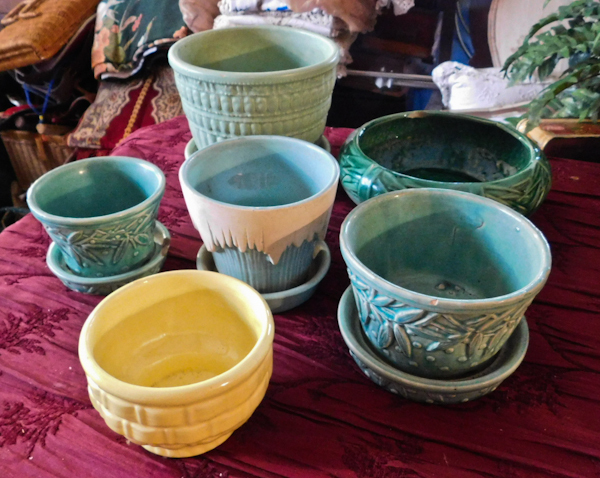 lot 149 image: 4 McCoy and 1 Haeger planters for garden or patio