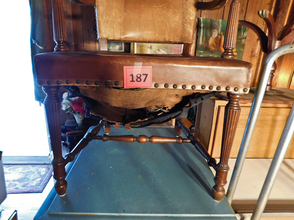 lot 187 image: vintage leather chair need some spring work