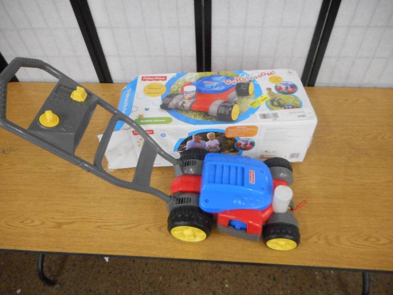 lot 8 image: FISHER PRICE BUBBLE MOWER