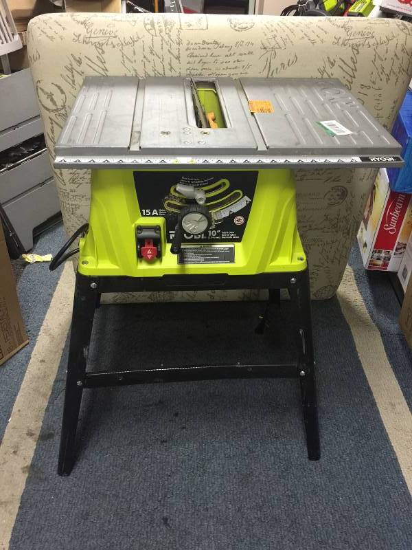 lot 177 image: Ryobi 15 Amp 10 in. Table Saw Tested works well missing guide and attachments