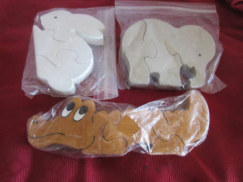 3 HAND CARVED WOODEN PUZZLES