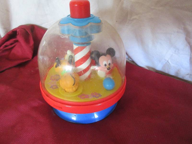 COLLECTIBLE PUSHTOP TOY