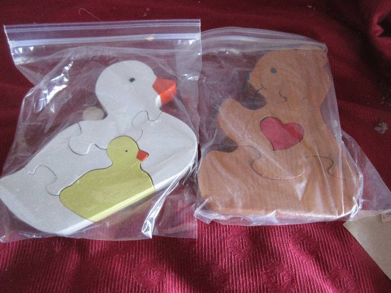 2 HAND CRAFTED WOOD PUZZELS