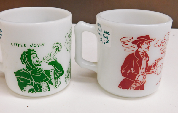 lot 13 image: Vintage Robin Hood & Wyatt Earp, milk glass mugs