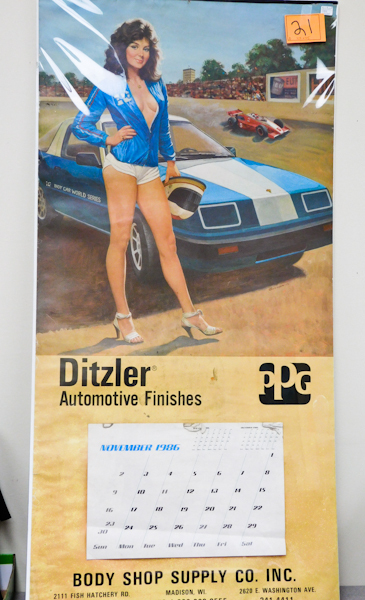 lot 21 image: Vintage Auto Shop Pin-Up Girl CalendarPoster