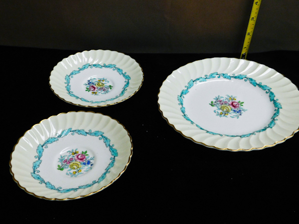 lot 103 image: china dinner plate and two saucers