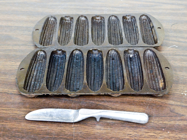 lot 106 image: 2 classic cast iron corn cake pans