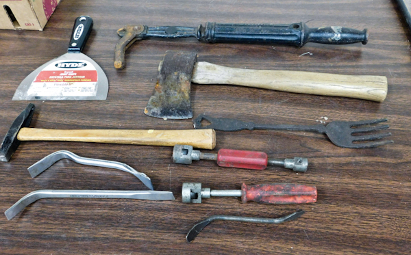 lot 107 image: brake tools cast iron nail puller and more