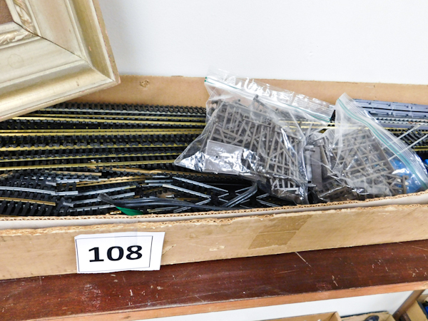 lot 108 image: several pieces of railroad track many shapes and sizes, a bridge and junctions
