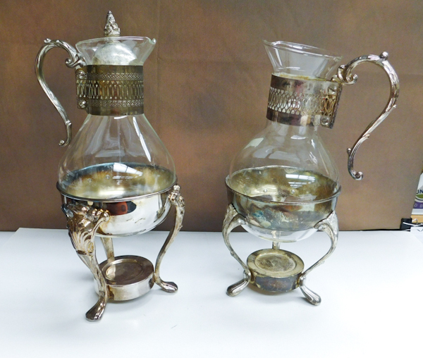 lot 199 image: two glass  and silver-plate coffee or tea carafes  with decanter and warmer stands