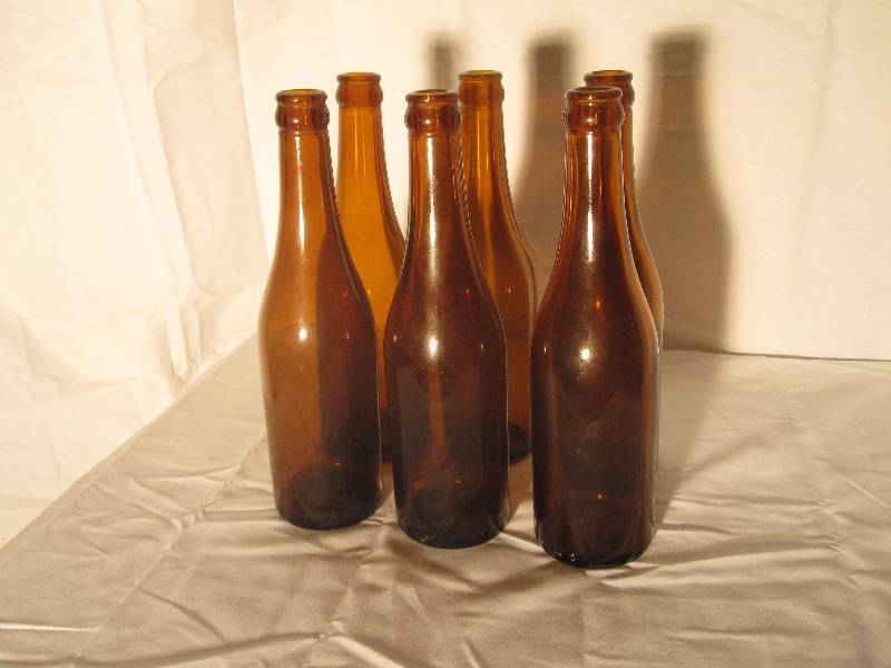 lot 16 image: 6 vintage 1920s beer bottles