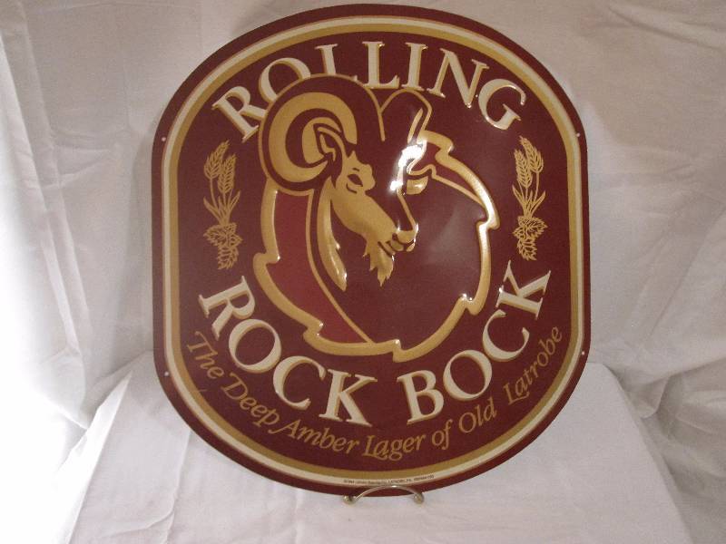lot 23 image: Rolling Rock Bock tin advertising sign