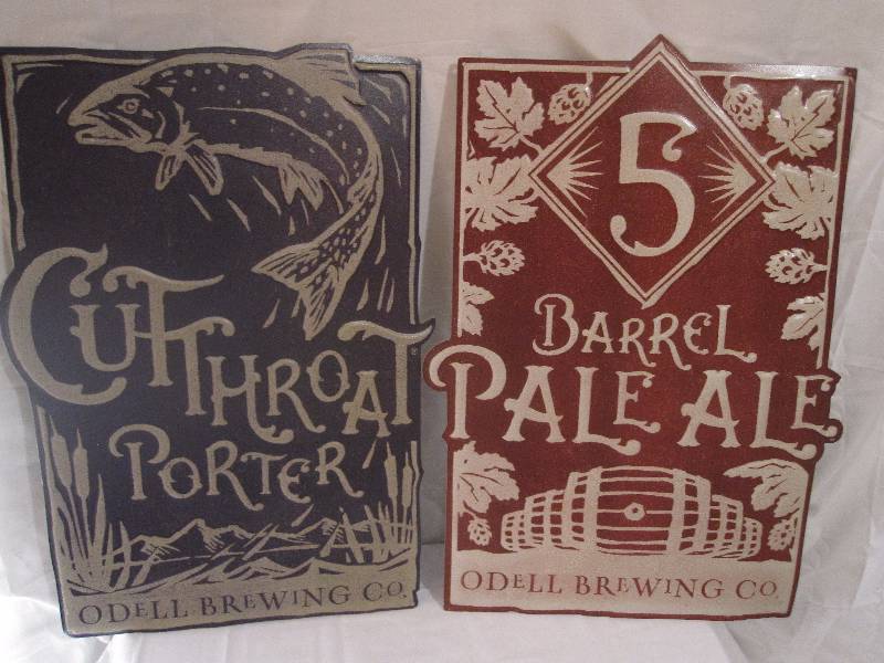 lot 25 image: 2 Odell Brewing company tin advertising signs