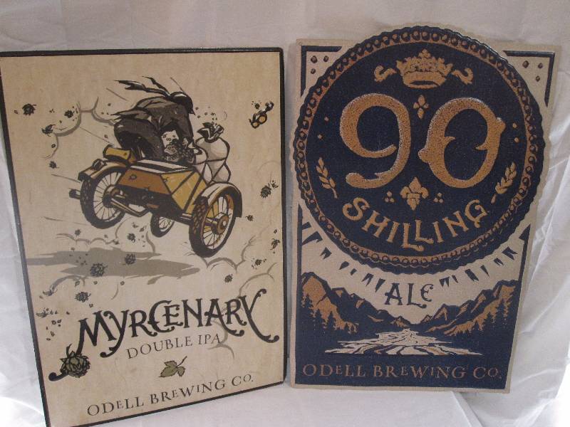 lot 26 image: 2 Odell Brewing Company advertising tin signs