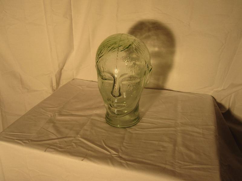 lot 28 image: Glass mannequin head