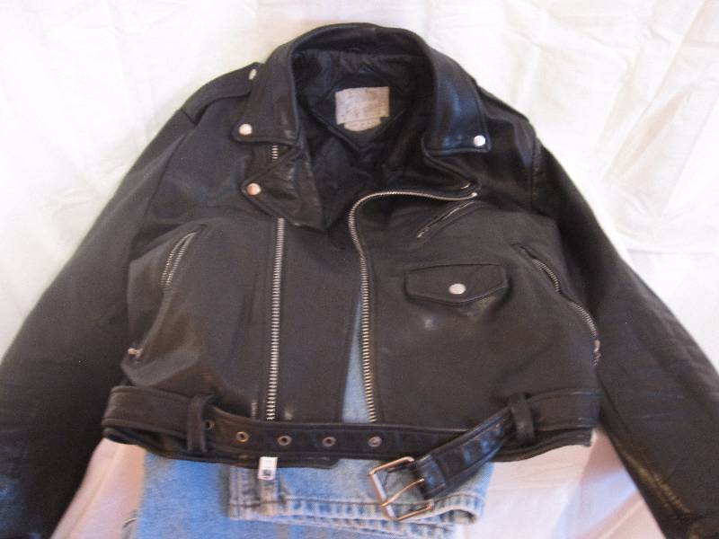lot 76 image: Vintage leather motorcycle jacket and vintage Levis jeans
