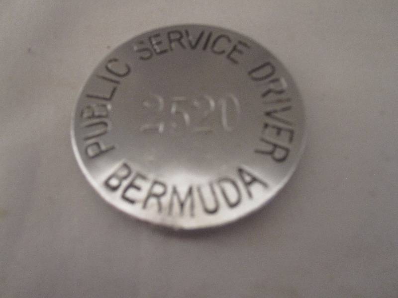 lot 88 image: Rare vintage Bermuda Public Service Driver badge