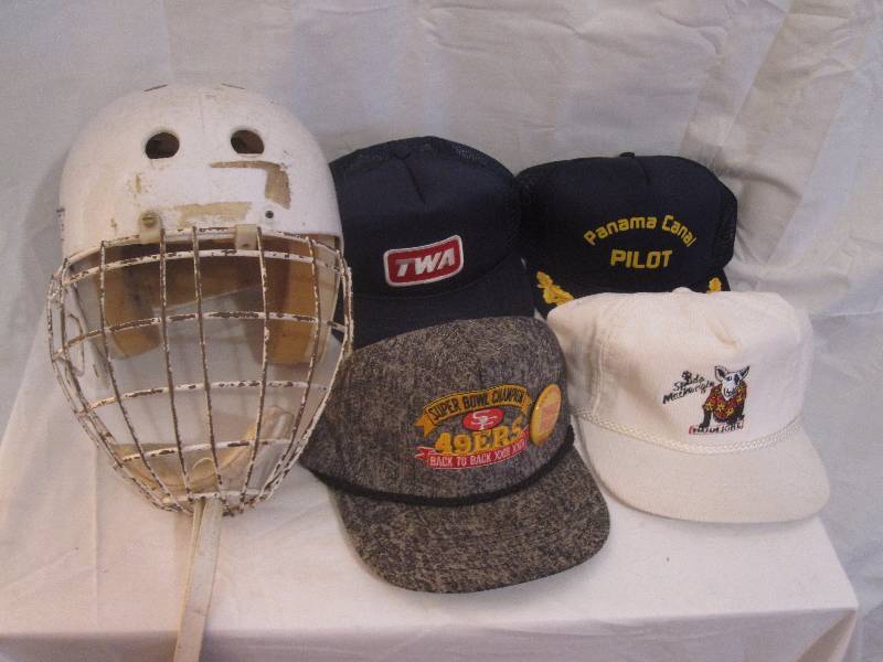 lot 125 image: Vintage Hockey helmet, various hat lot