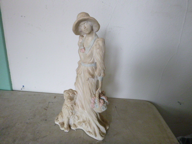 Women with her Pet Figurine