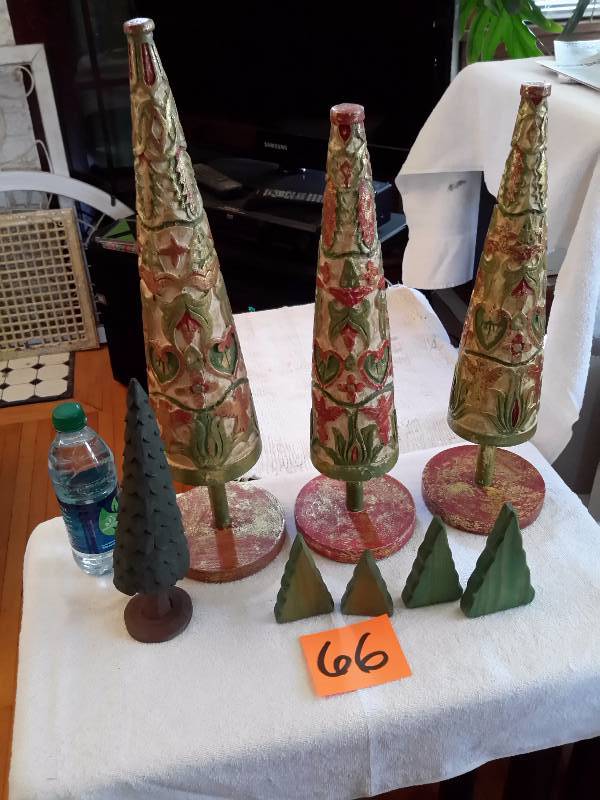 Wood Carved Christmas Trees as pictured.. Intricately painted.. 4 cutout trees