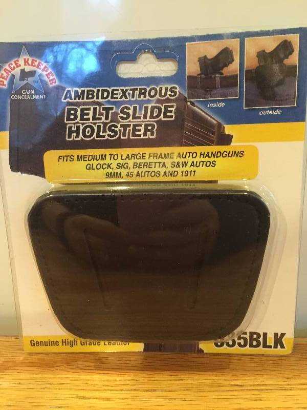 lot 5 image: Ambidextrous Belt Slide Holster