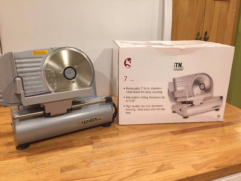 lot 28 image: Gander Mountain Meat Slicer